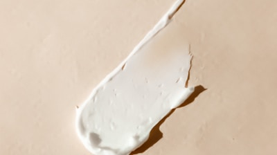 white cotton buds on white surface